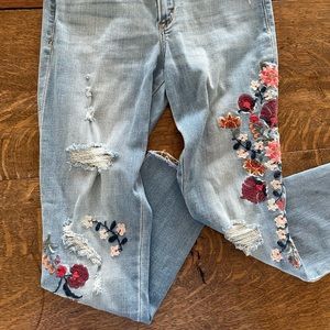 Embroidered low rise light wash jeans